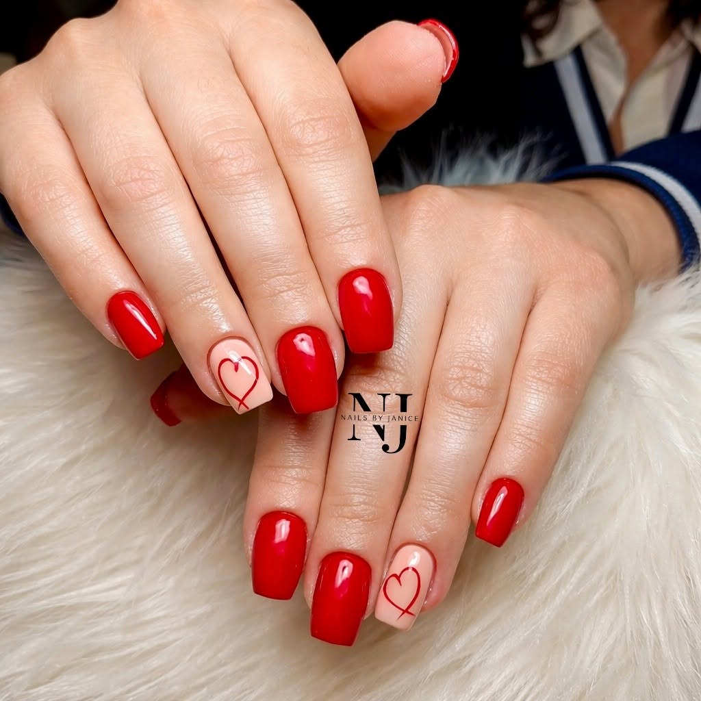Classic red square nails with red heart accent design